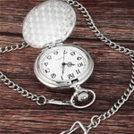 Montre de poche gravée