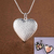 Pendentif coeur ouvert strie