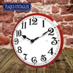 horloge émaillée rouge et blanche rétro