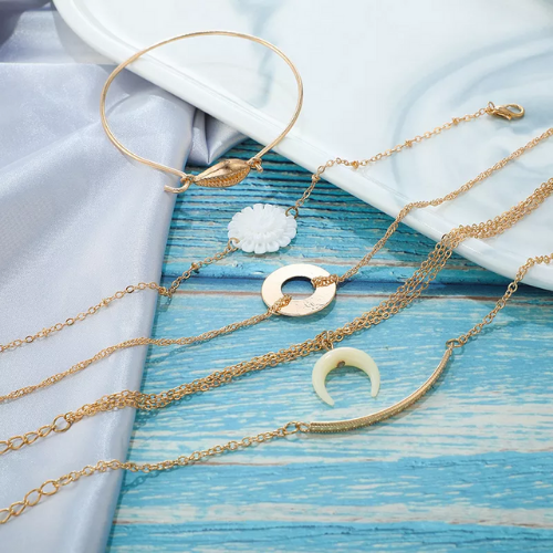 set de bracelets multiples dorés et blancs fleur coquillage bijoux fantaisie