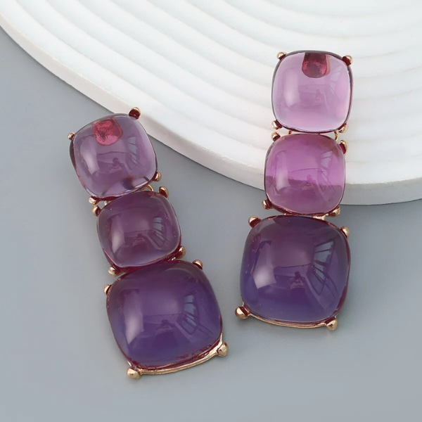 boucles doreilles transparentes violettes
