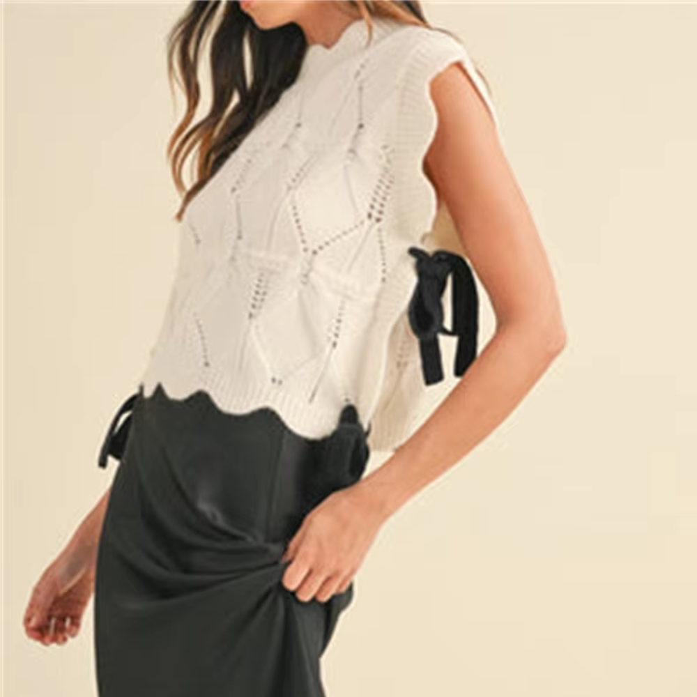 pull sans manches blanc noué