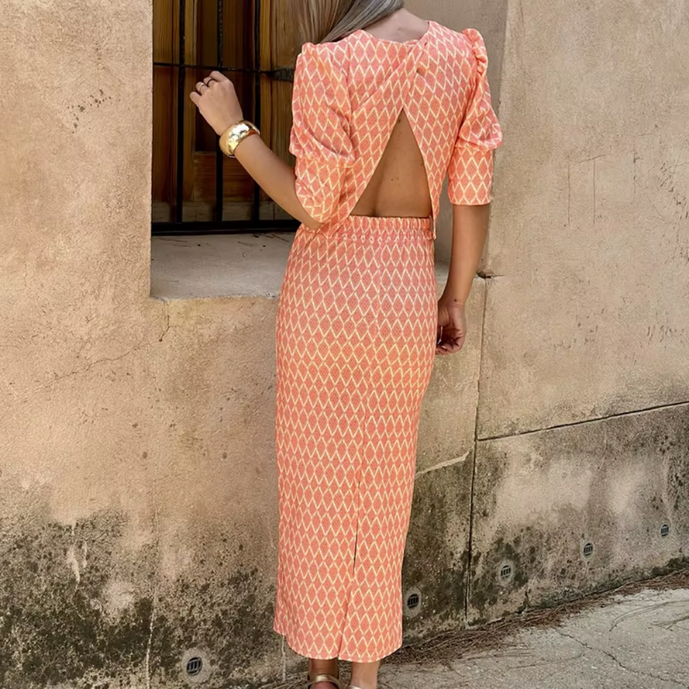 Ensemble haut et robe à manches bouffantes et jupe fendue chic