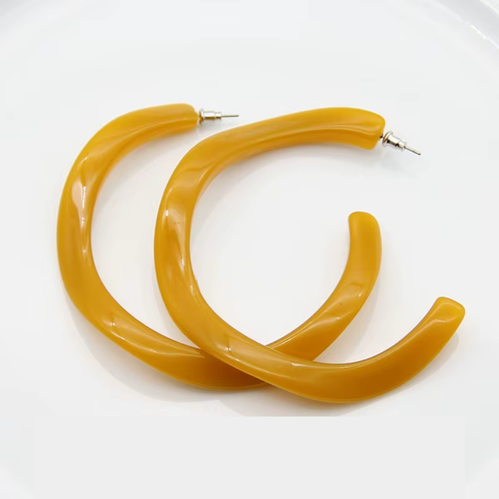 créoles en résine ambre jaune