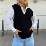 pull sans manche noir tendance hiver 2021
