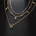 collier doré fantaisie étoile pierre noire bijouterie tendance pas chère