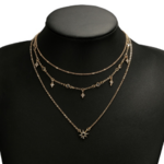 collier doré fantaisie étoile pierre noire bijoux la selection parisienne