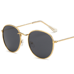 Lunettes de soleil rondes femme rétro dorées