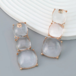 boucles doreilles transparentes dorées