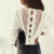 pull blanc détails dos broderies transparant chic femme