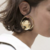 boucles d'oreilles pendantes dorées rondes