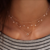 collier doré fantaisie étoile pierre noire