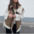 manteau sans manche fourrure mouton cuir femme