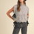 pull sans manches gris noué