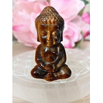 bouddha oeil de tigre sur fleur de vie en sélénite