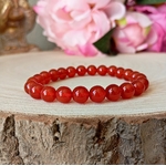 bracelet cornaline sur tranche de bois