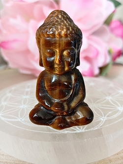 petite sculpture de bouddha en oeil de tigre