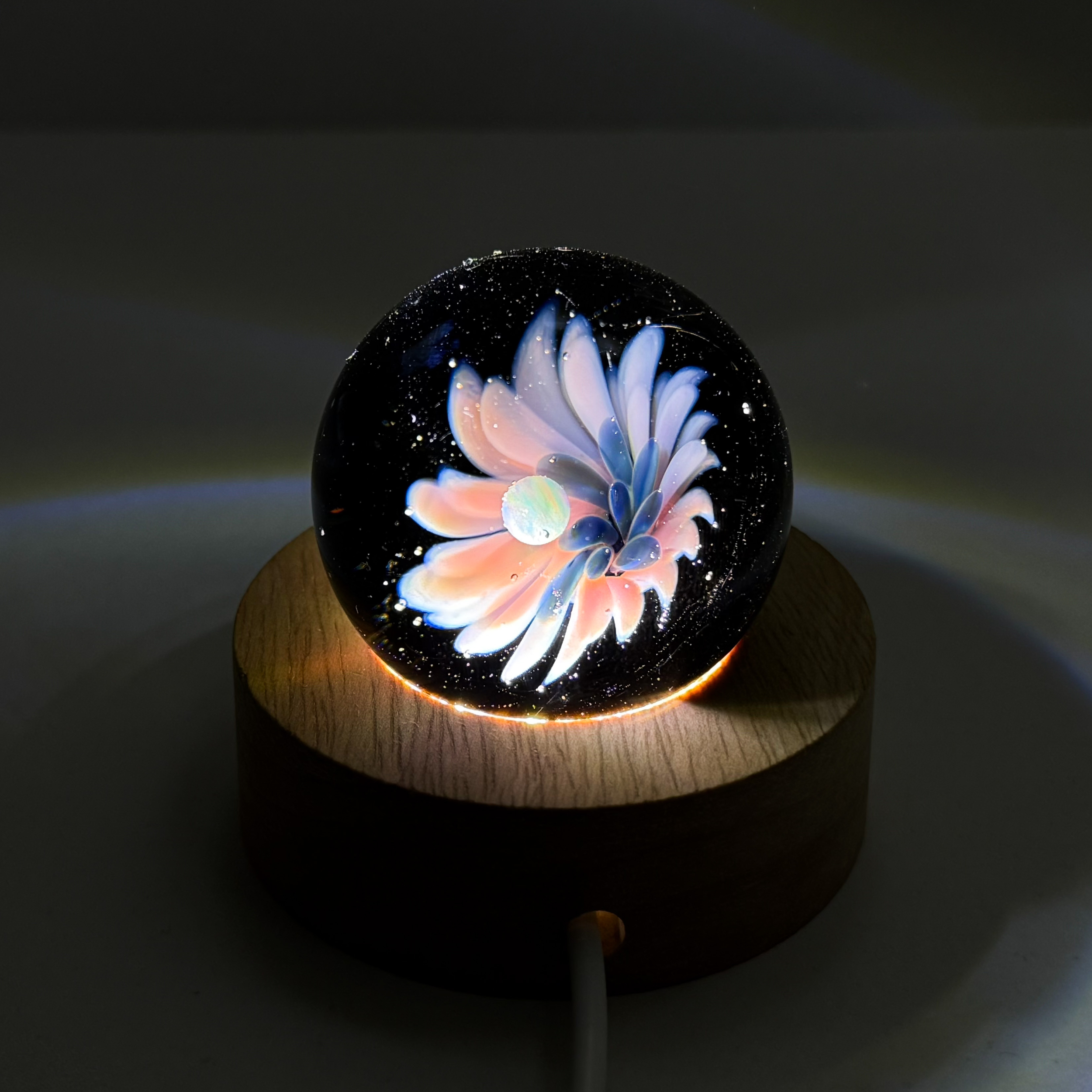 Sphère de verre fleur galactique