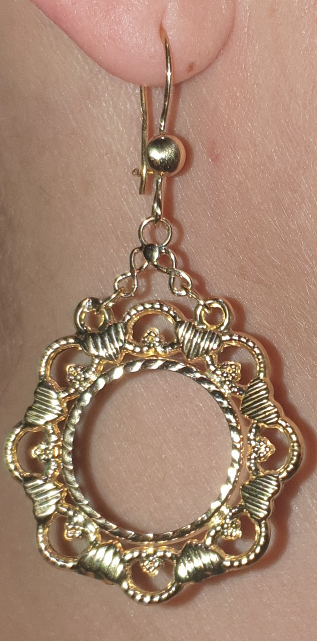 Boucles d\'oreilles porte pièces