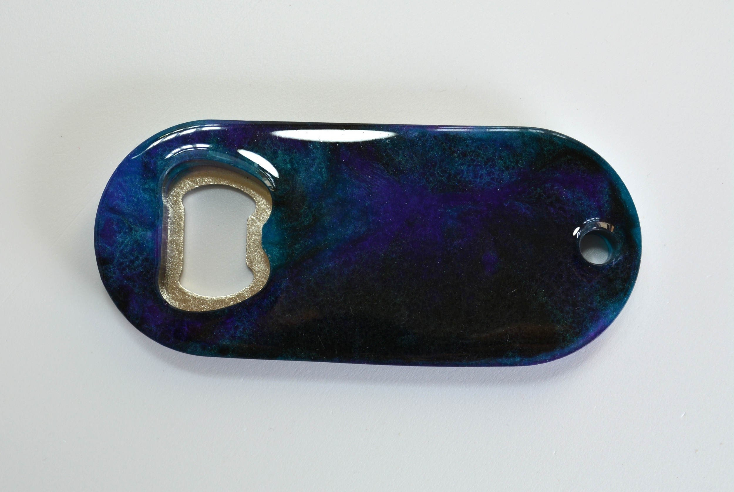 Décapsuleur violet, bleu et noir 3