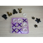 Morpion violet et paillettes