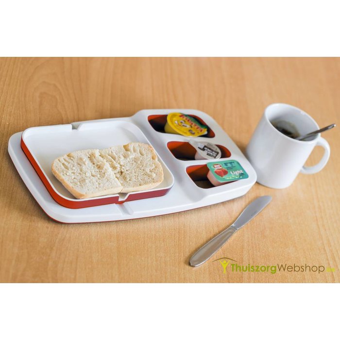 theomatik-en-cours-d-utilisation-avec-tartine-et-petits-pots-confiture-et-beurre-calés-dans-encoches