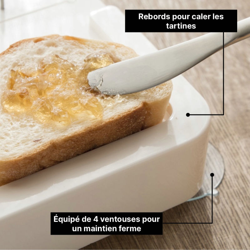 un-couteau-tartine-tranche-pain-calee-dans-rebord-plan-preparation-repas-maxi-fixe-par-ventouse