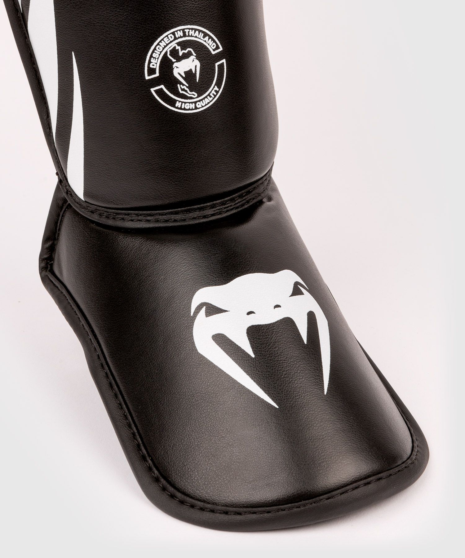 protege-tibias-venum-challenger-enfant-noir-blanc