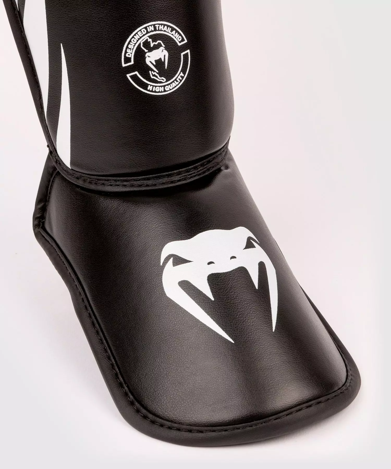 protege-tibias-venum-challenger-enfant-noir-blanc