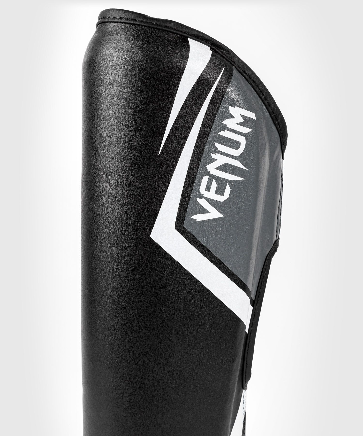 protege-tibias-contender-venum-noir-gris-blanc