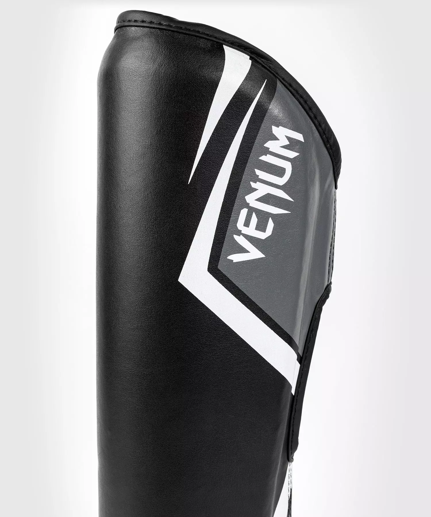 protege-tibias-contender-venum-noir-gris-blanc