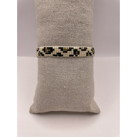 Bracelet Jaya motif léopard blanc noir doré bohème noeud coulissantchic Bella Cosa