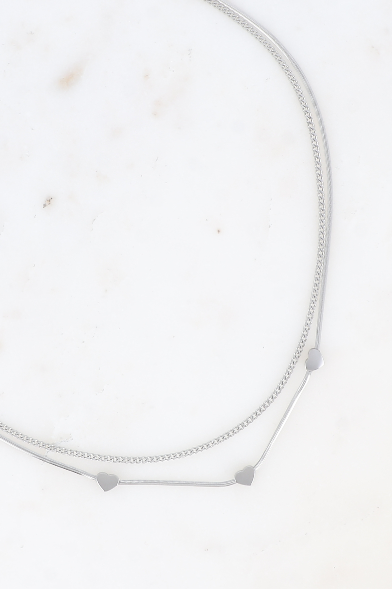 Collier multi-rangs argenté Pola, deux chaînes fines avec cœurs, bijou romantique en acier inoxydable