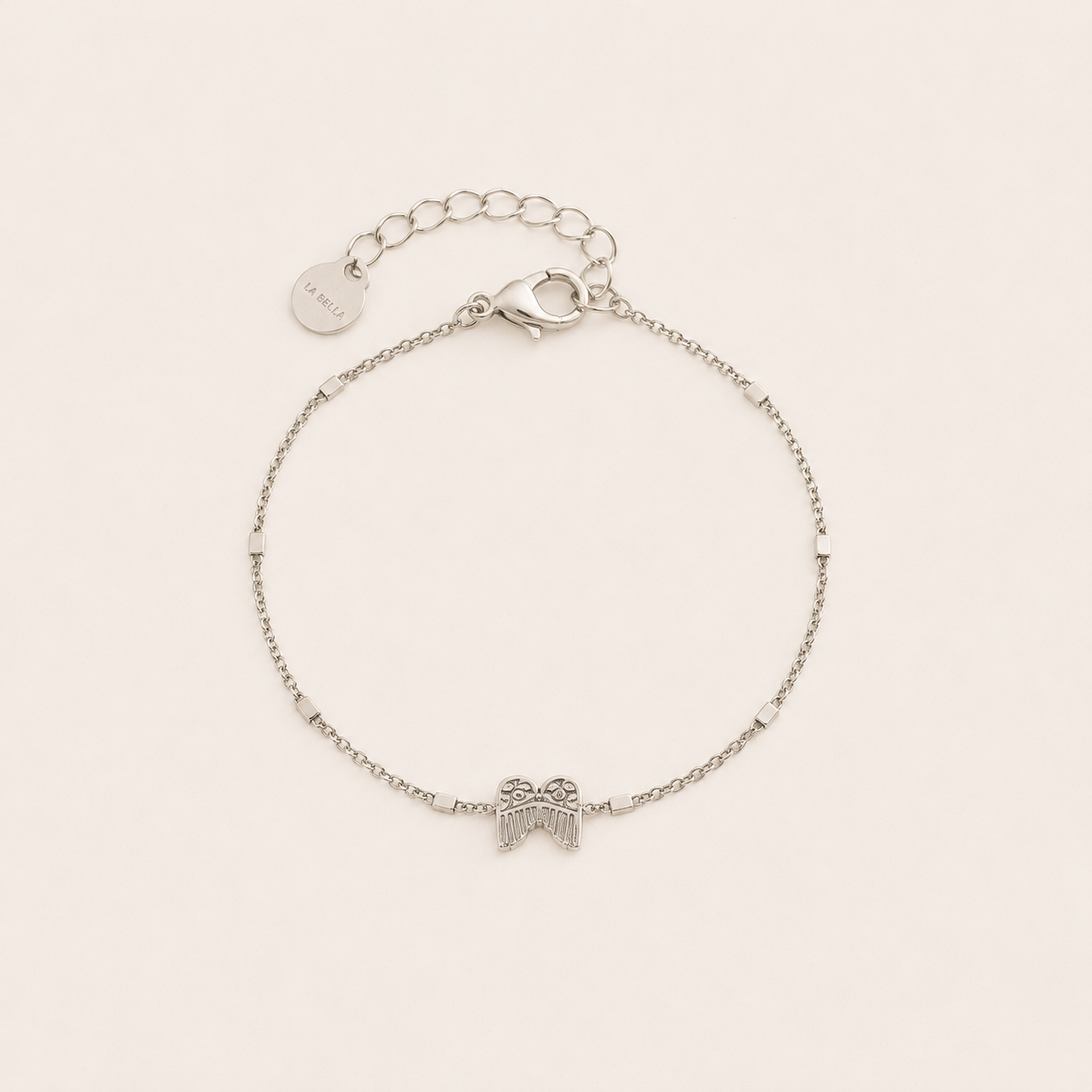 Bracelet Ange argenté en acier inoxydable avec pendentif ailes fines – bijou minimaliste femme Bella Cosa