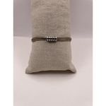 Bracelet Hasna fil de soie taupe anneaux acier inoxydable ajustable noeud coulissant Bella Cosa