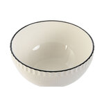 Bol en porcelaine blanc utilisé sur une table moderne et épurée