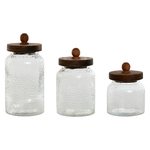 Pots en verre avec couvercles en bois d’acacia sur étagère