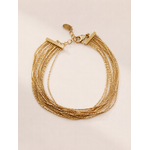 Bracelet Kali doré multi-rangs en acier inoxydable sur fond beige naturel