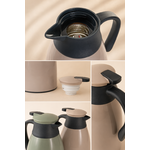 Détails du thermos isotherme beige et vert sauge avec vue intérieure, bouchon hermétique, poignée ergonomique et finitions design dans une ambiance minimaliste chaleureuse et premium
