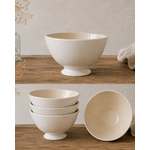 Bol en faïence blanc avec intérieur ivoire présenté dans une ambiance naturelle et chaleureuse sur table en bois