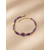 Bracelet Vickie violet lavande et doré sur fond beige doux et chaleureux