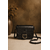 Sac bandoulière noir Amy en similicuir grainé avec boucle dorée vintage dans une ambiance élégante et chaleureuse style maroquinerie premium