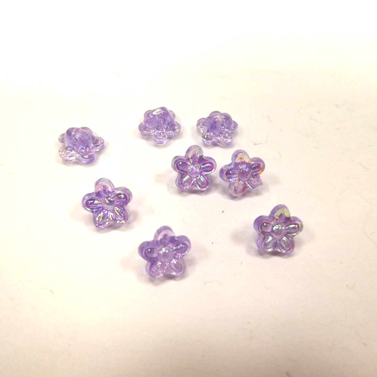 Boutons fleurs divers coloris au choix