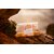 Peau neuve savon exfoliant au graines de pavot dans son emballage compostable, usage sur le corps et les mains