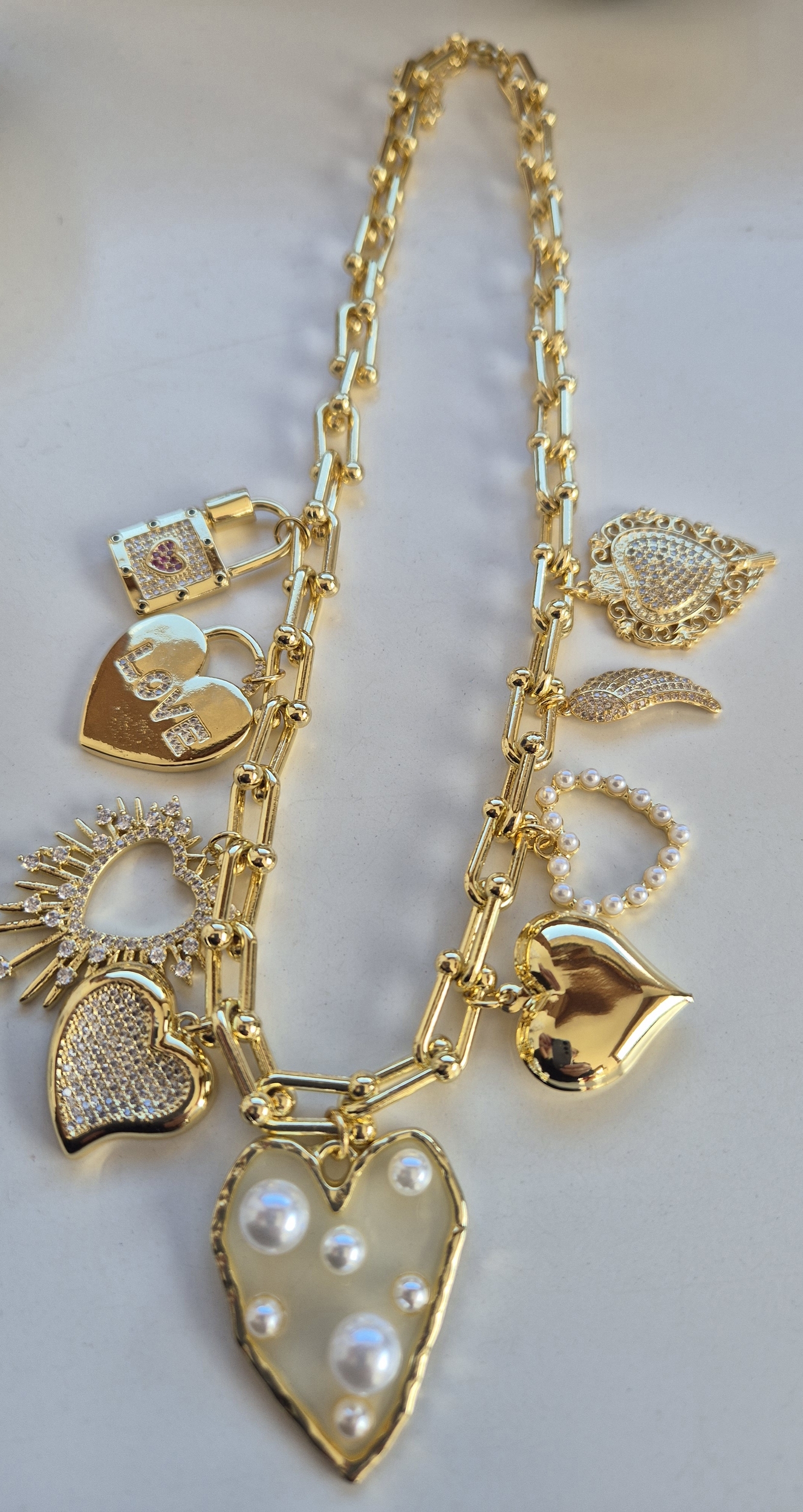 collier breloques coeur perlé