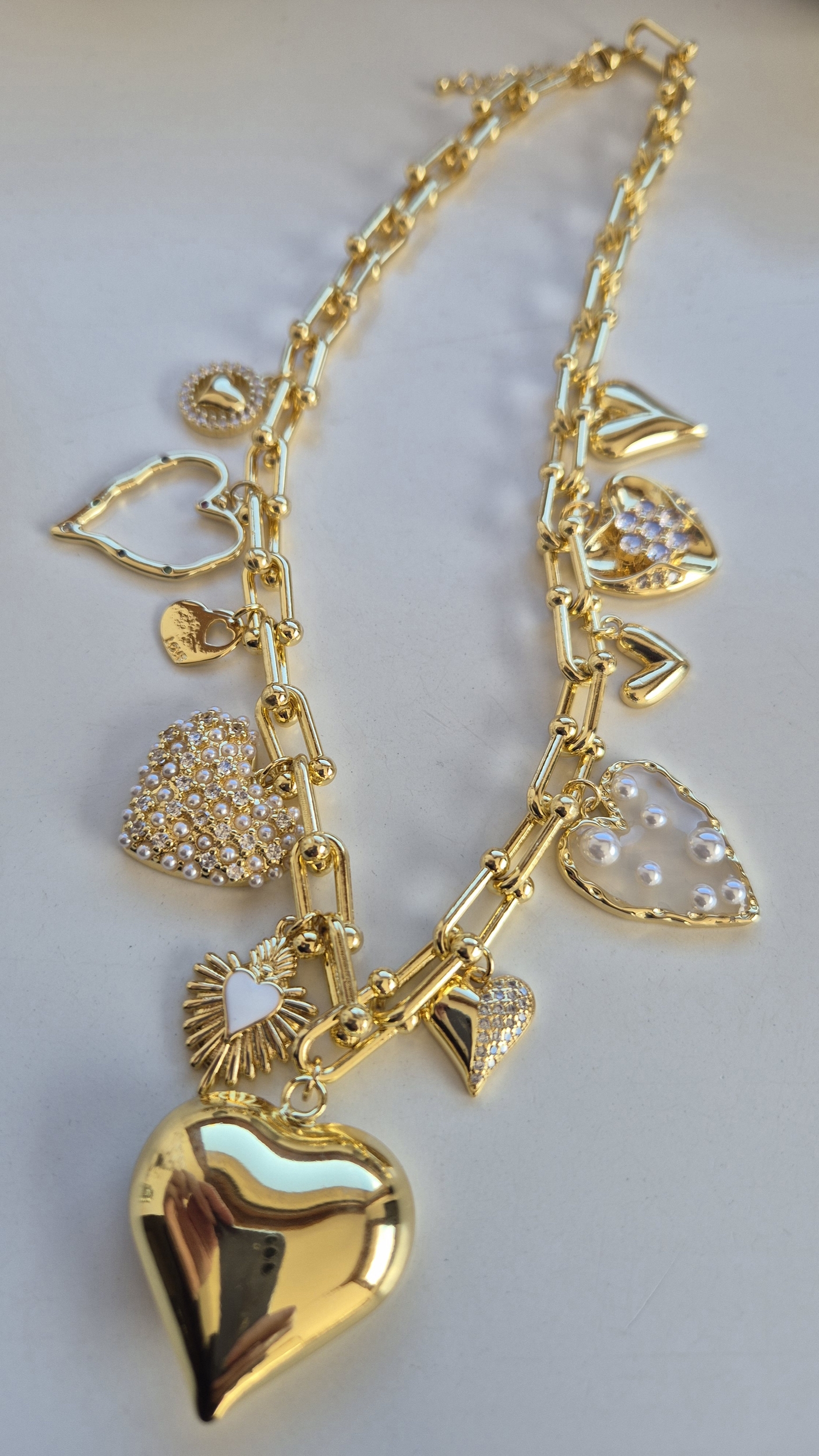 collier breloque multi coeur