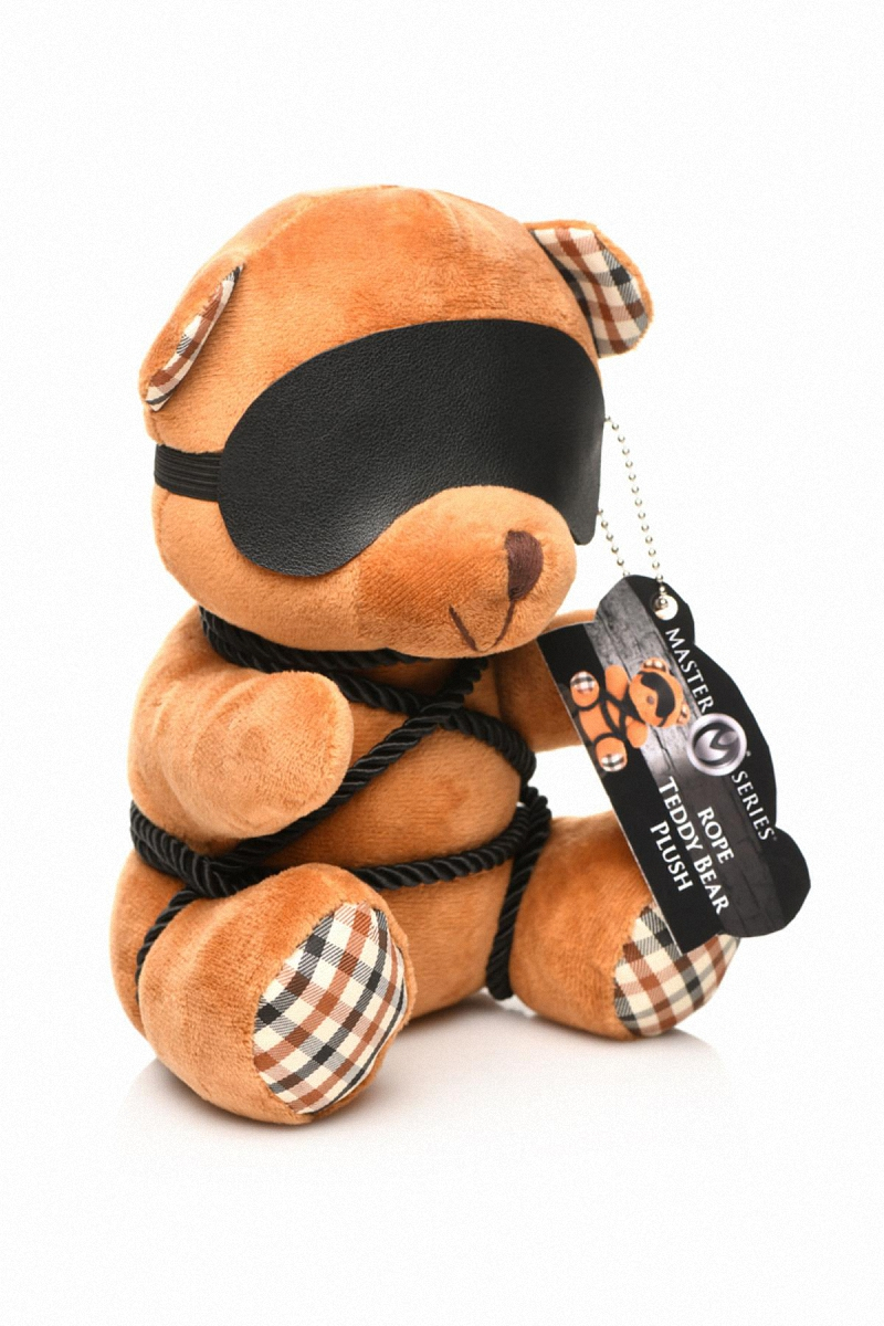 ours en peluche en tenue bondage