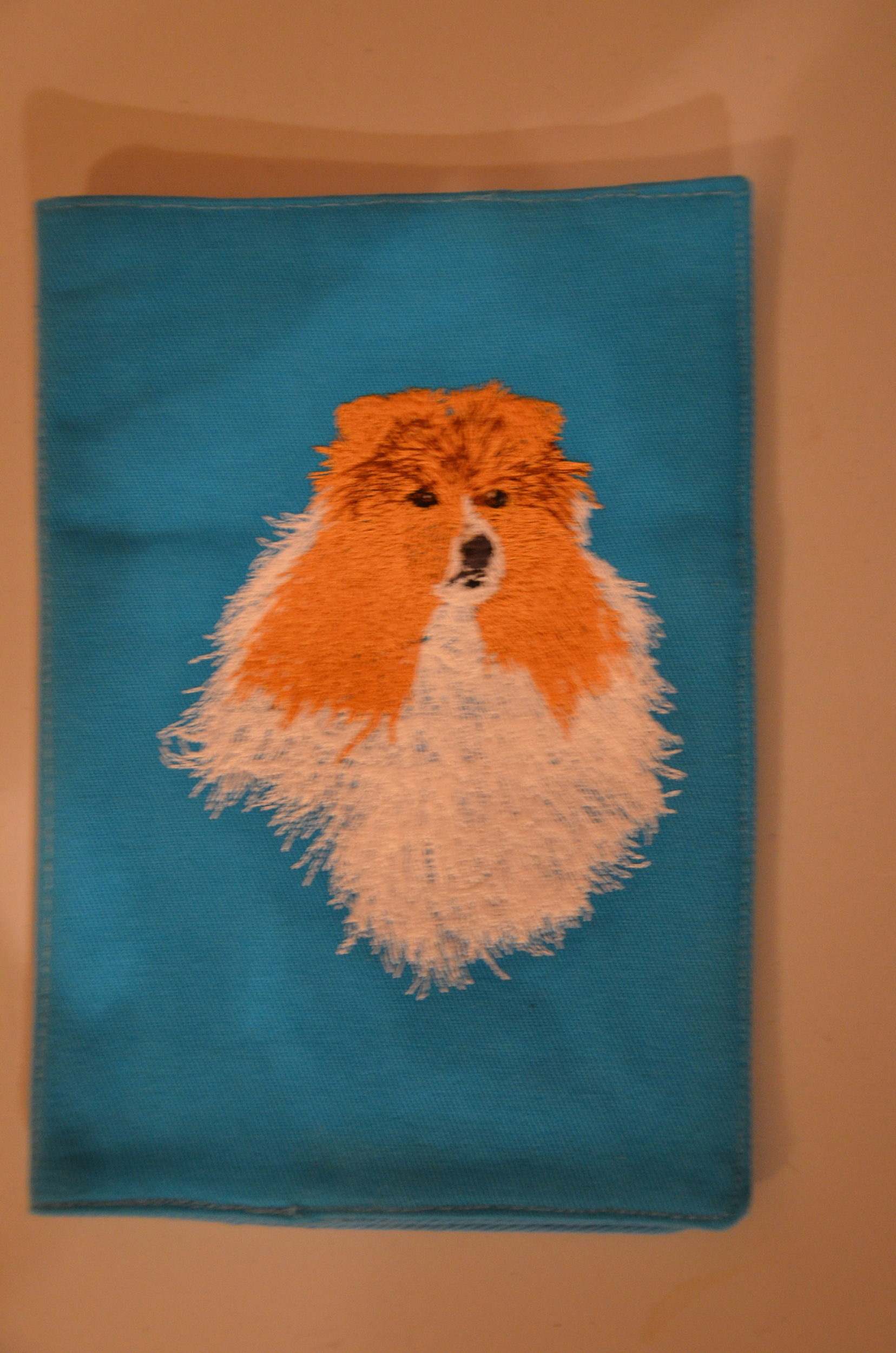 Broderie Berger des Shetland 21 - protège carnet de santé bleu turquoise