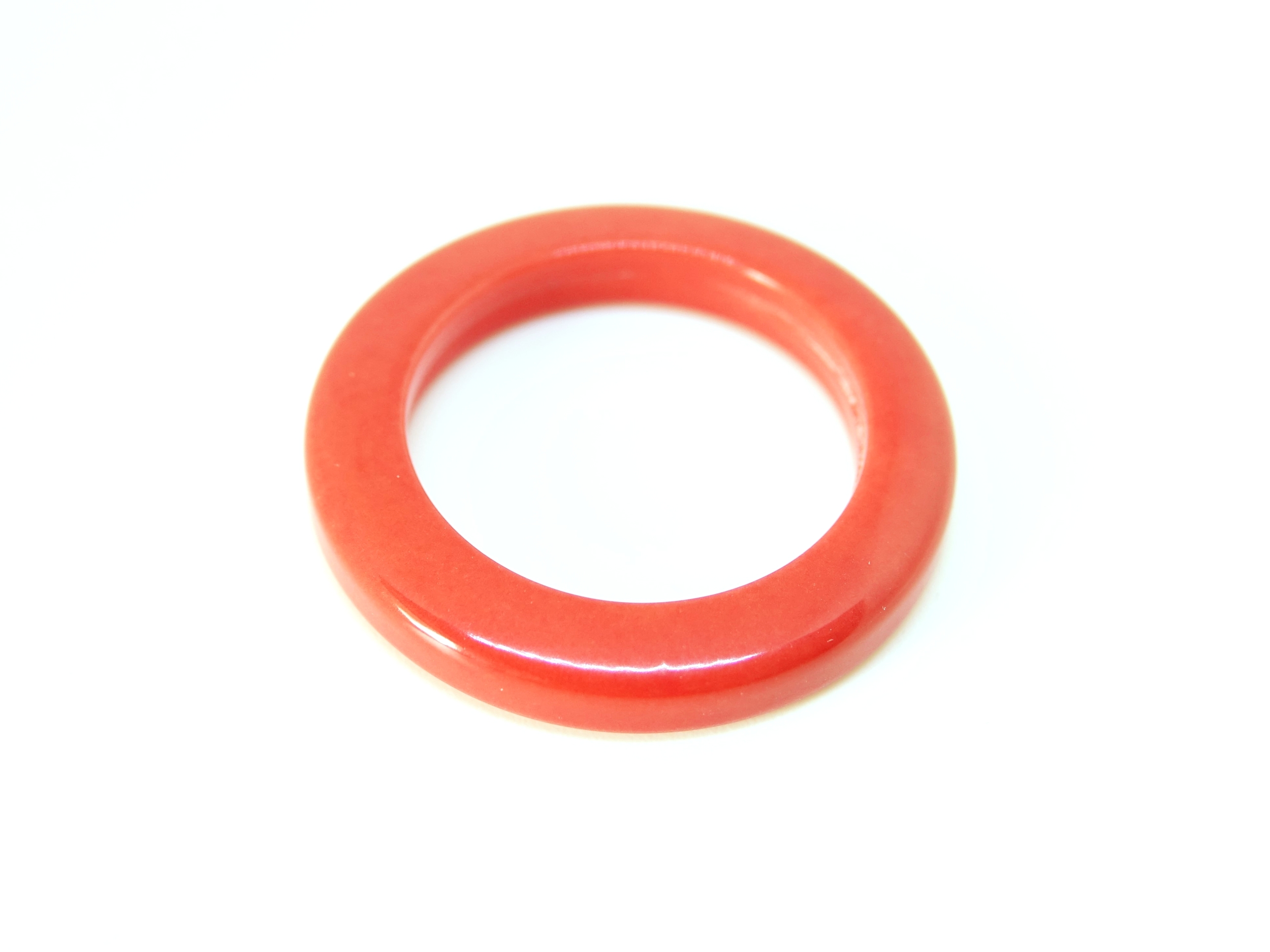 tagua anneau rouge clair