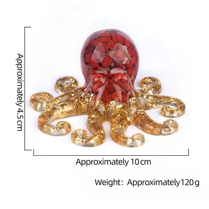dimensions dune pieuvre dornement en résine pailletée et agate rouge sur une main